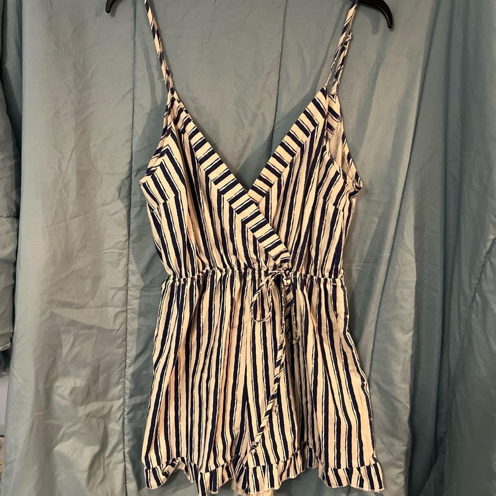 White romper with blue strips